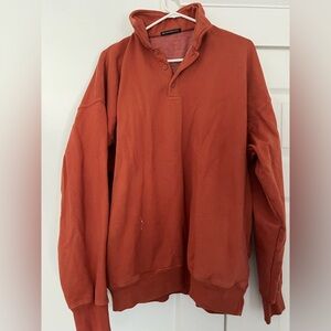 Orange/red brandy Melville sweater.